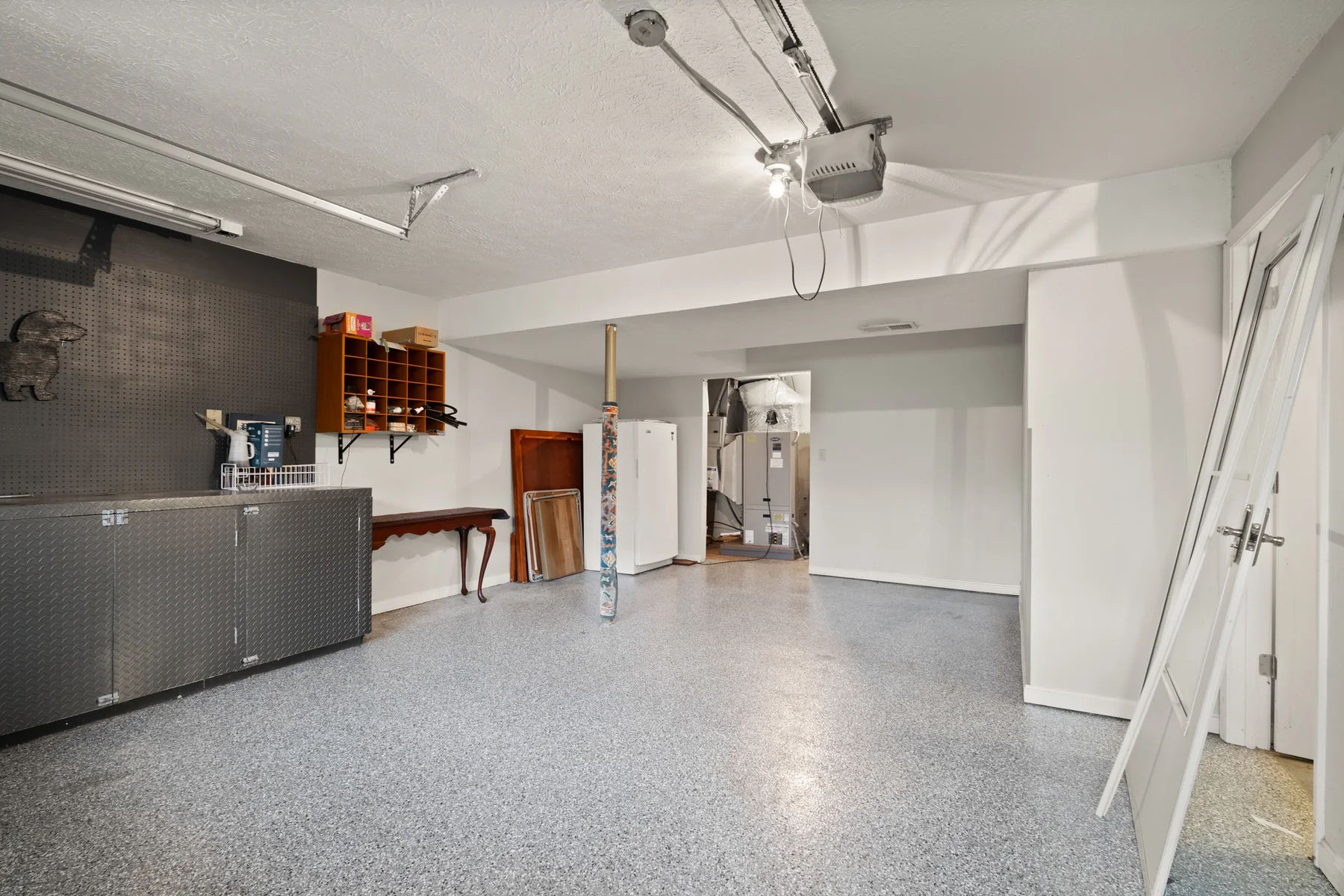Clean attached garage and workshop space