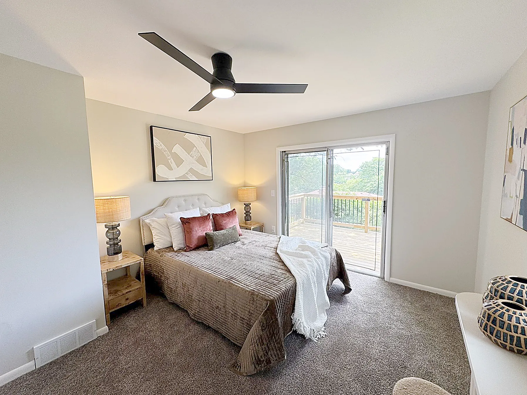 Staged primary bedroom on the second floor