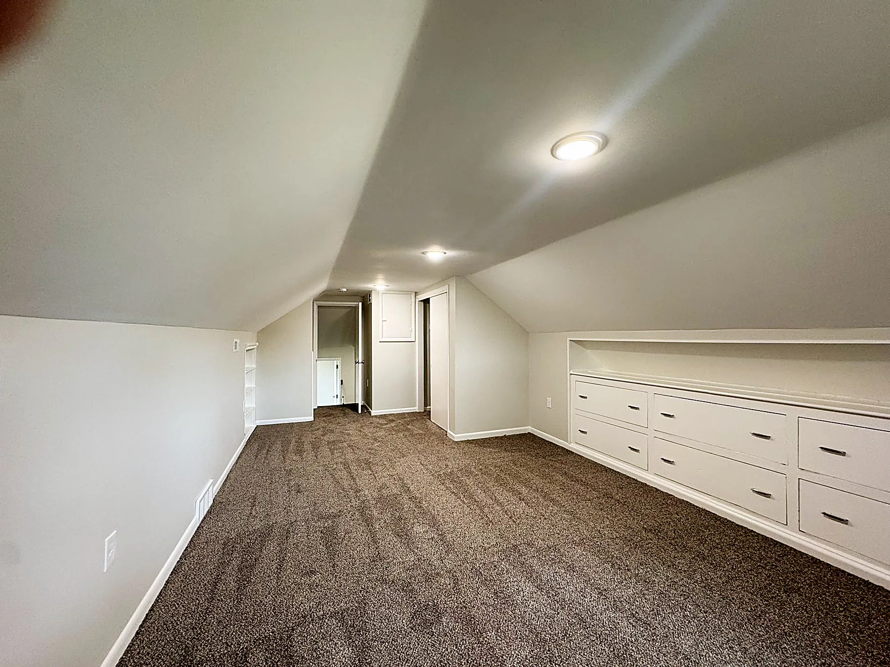 Spacious third-story fourth bedroom that works as an office or flex space
