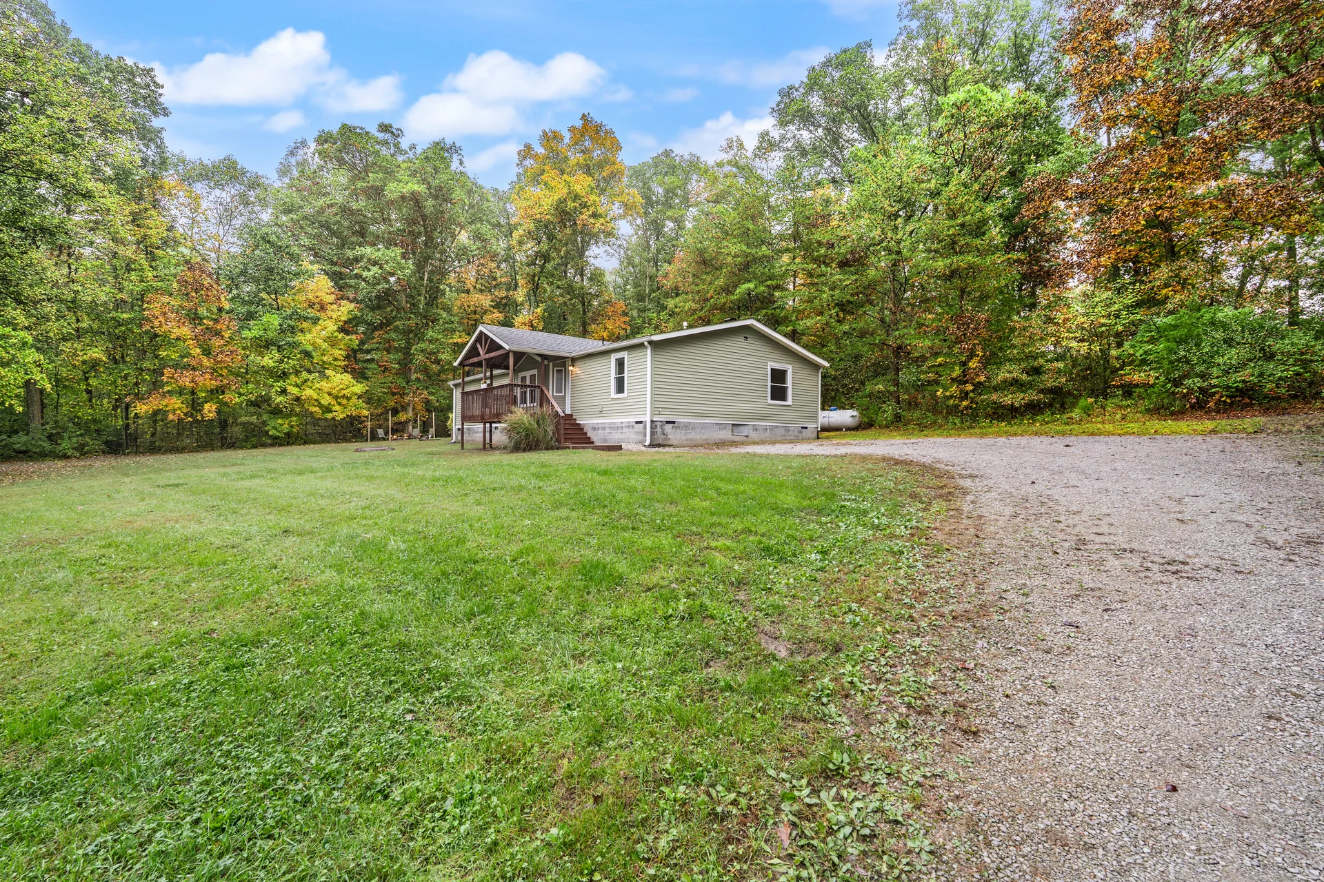 Gravel drive and yard at 2206 Old State Road