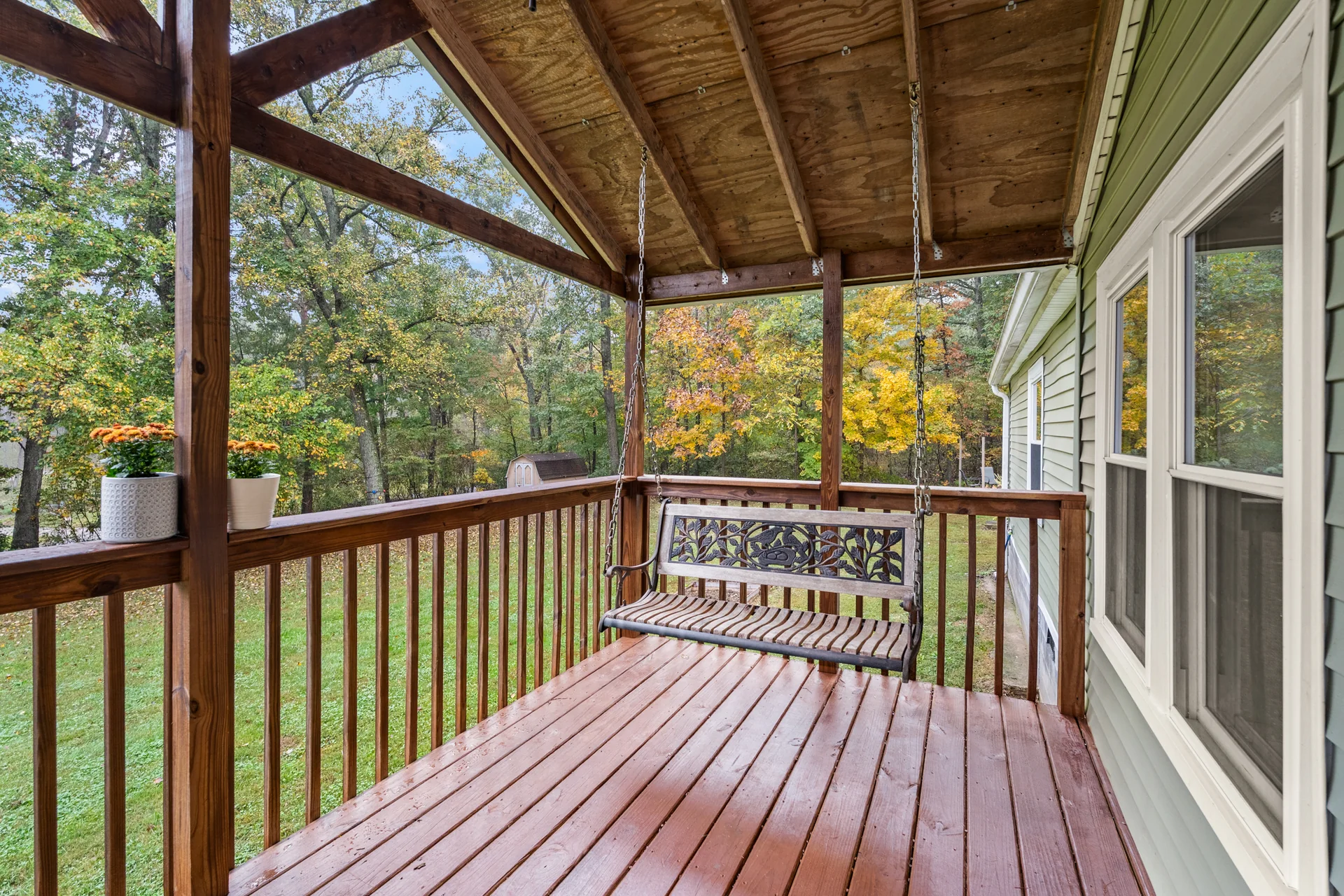 Covered porch and swing at 2206 Old State Road