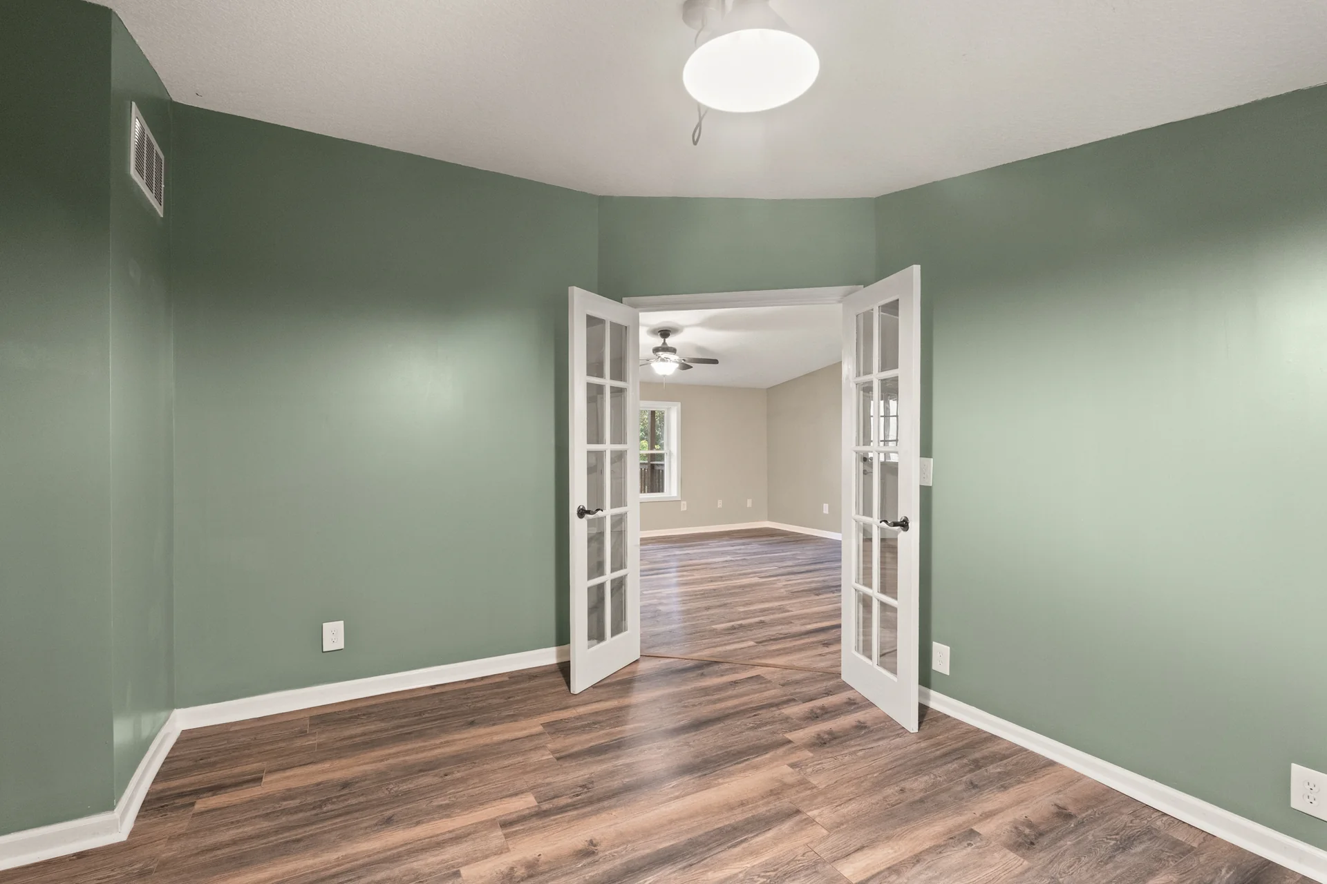 Green room toward the living area at 2206 Old State Road