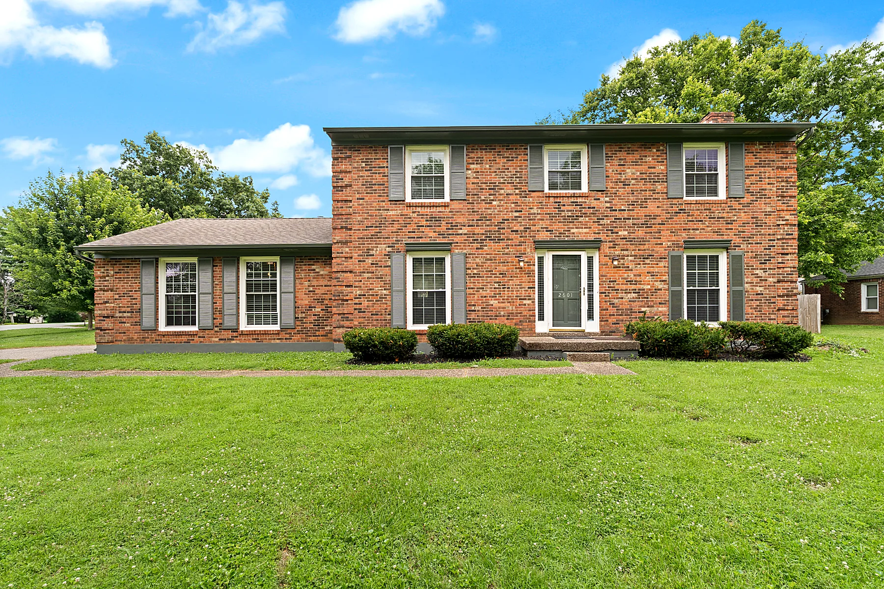Front exterior of 2601 Stony Brook Drive, a two-story Colonial in Louisville, Kentucky