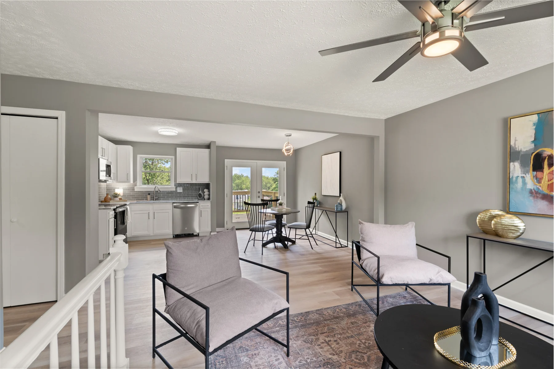 Open living room, dining area, and kitchen at 2704 Scales Court