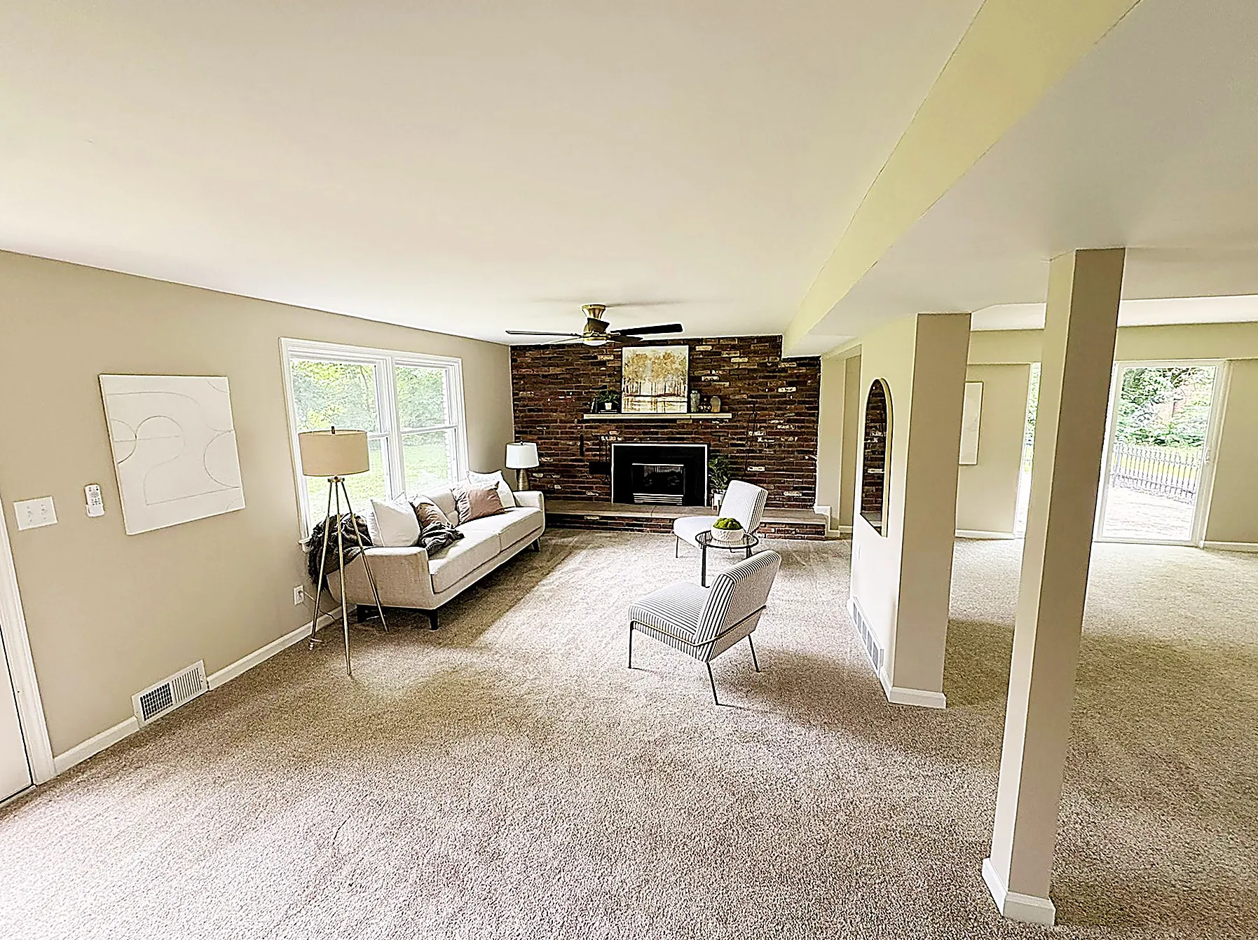 Carpeted lower-level living room
