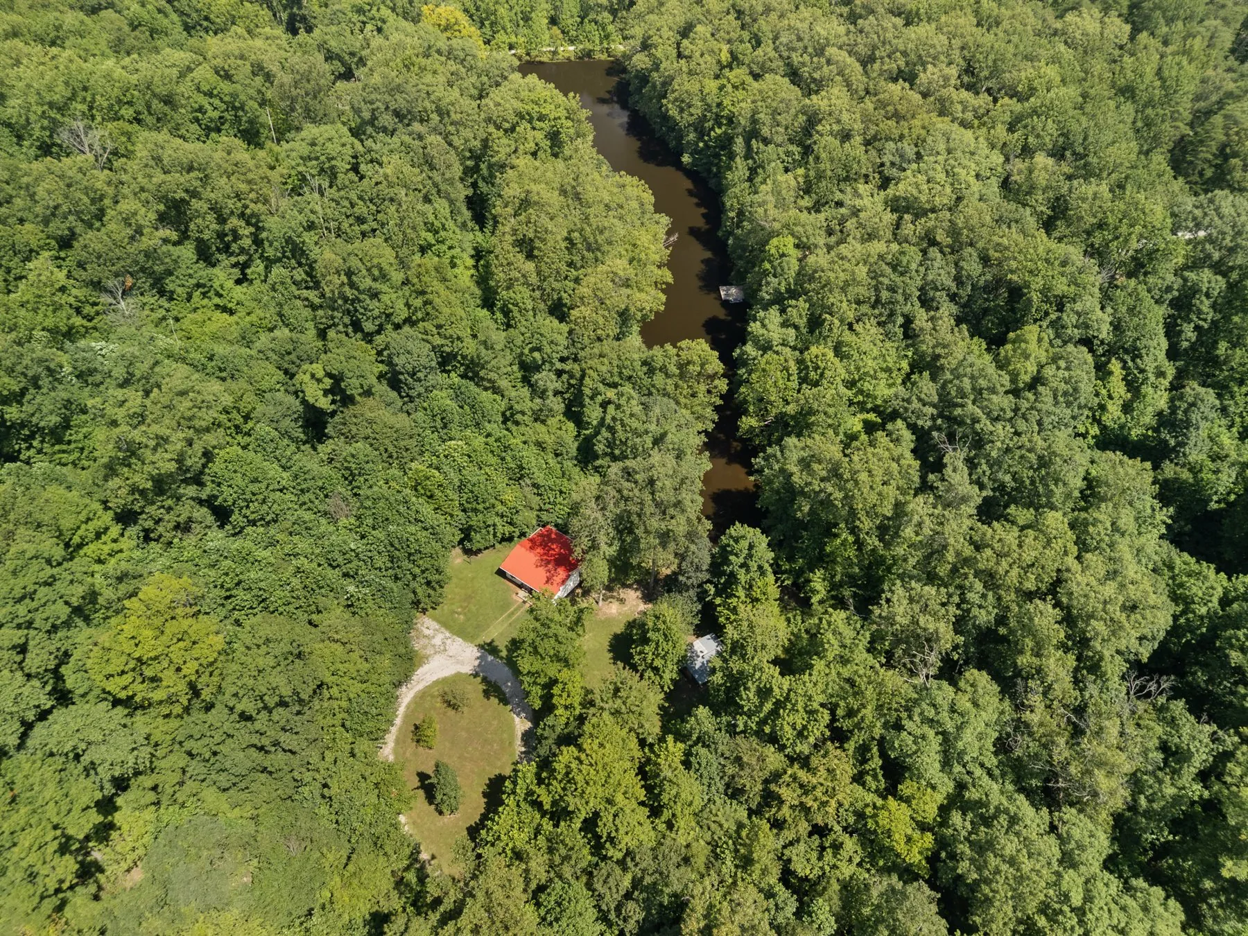 Aerial — the creek winding through the property