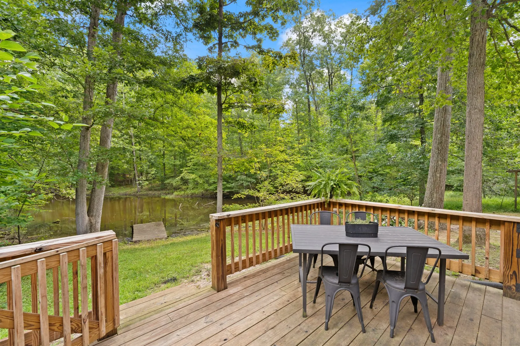 Deck dining with the lake beyond