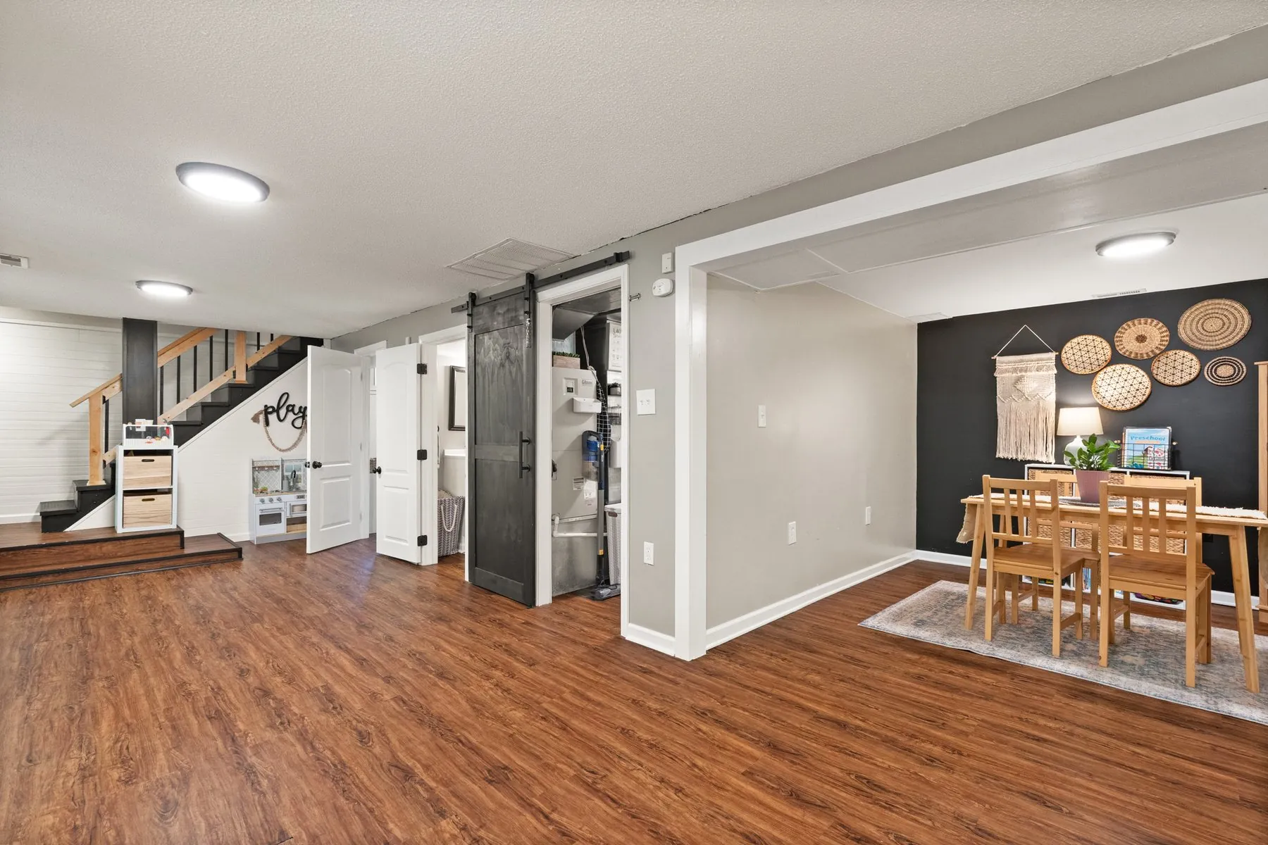 Open plan — stair down, dining beyond
