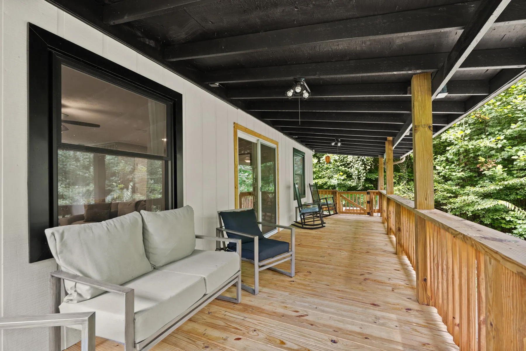 Balcony seating looking into the woods