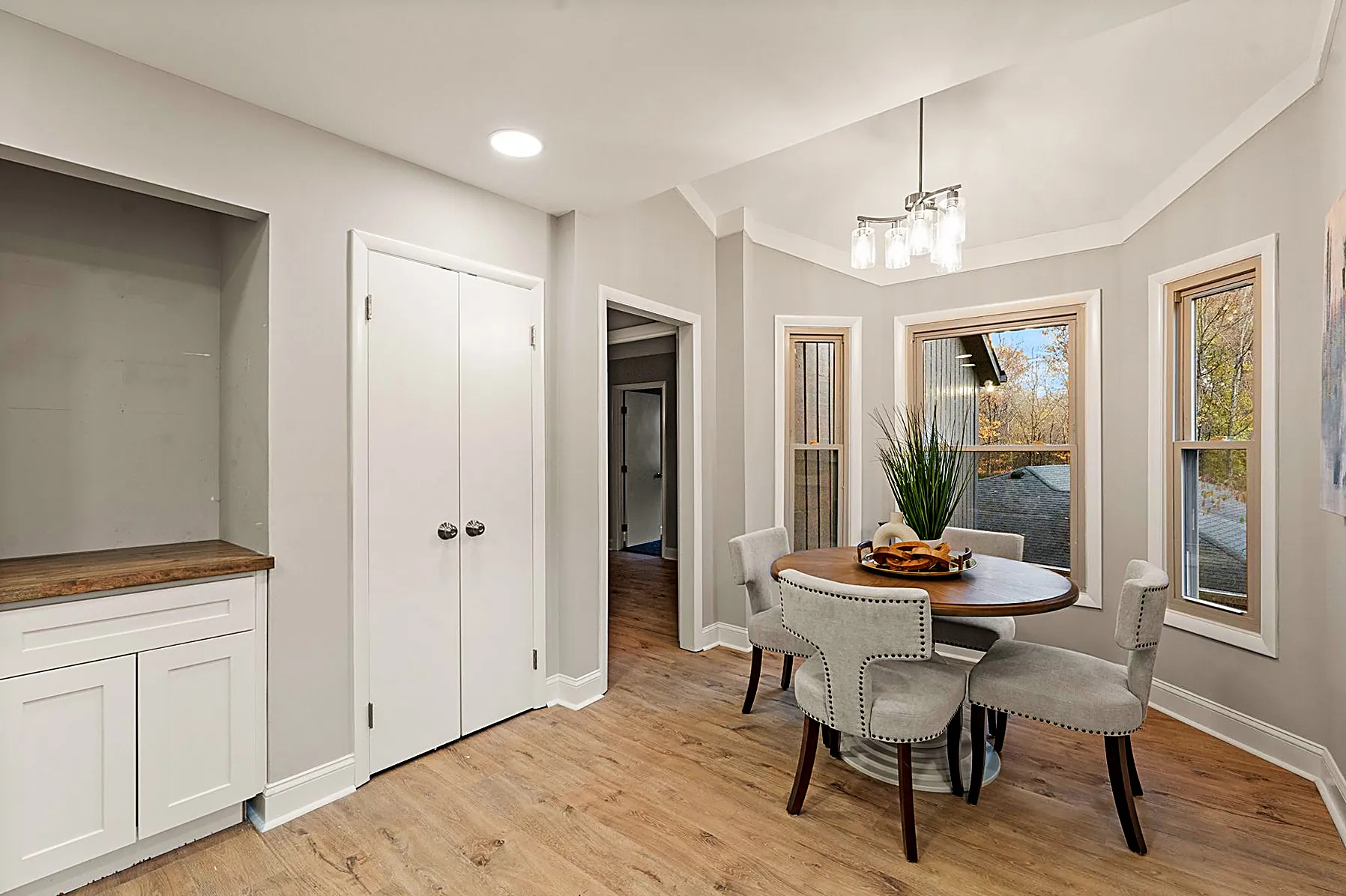 Breakfast nook off the kitchen with wooded views