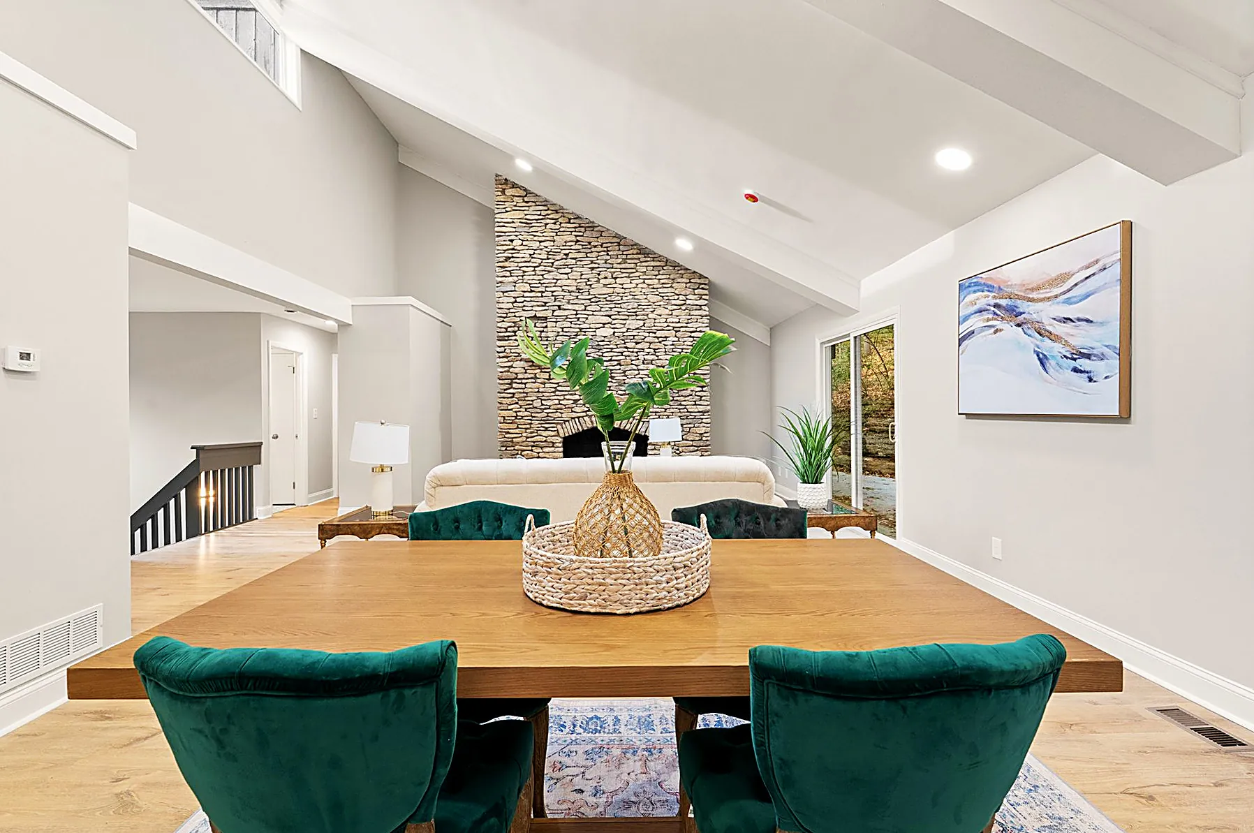 Dining area under vaulted, open-beam ceilings