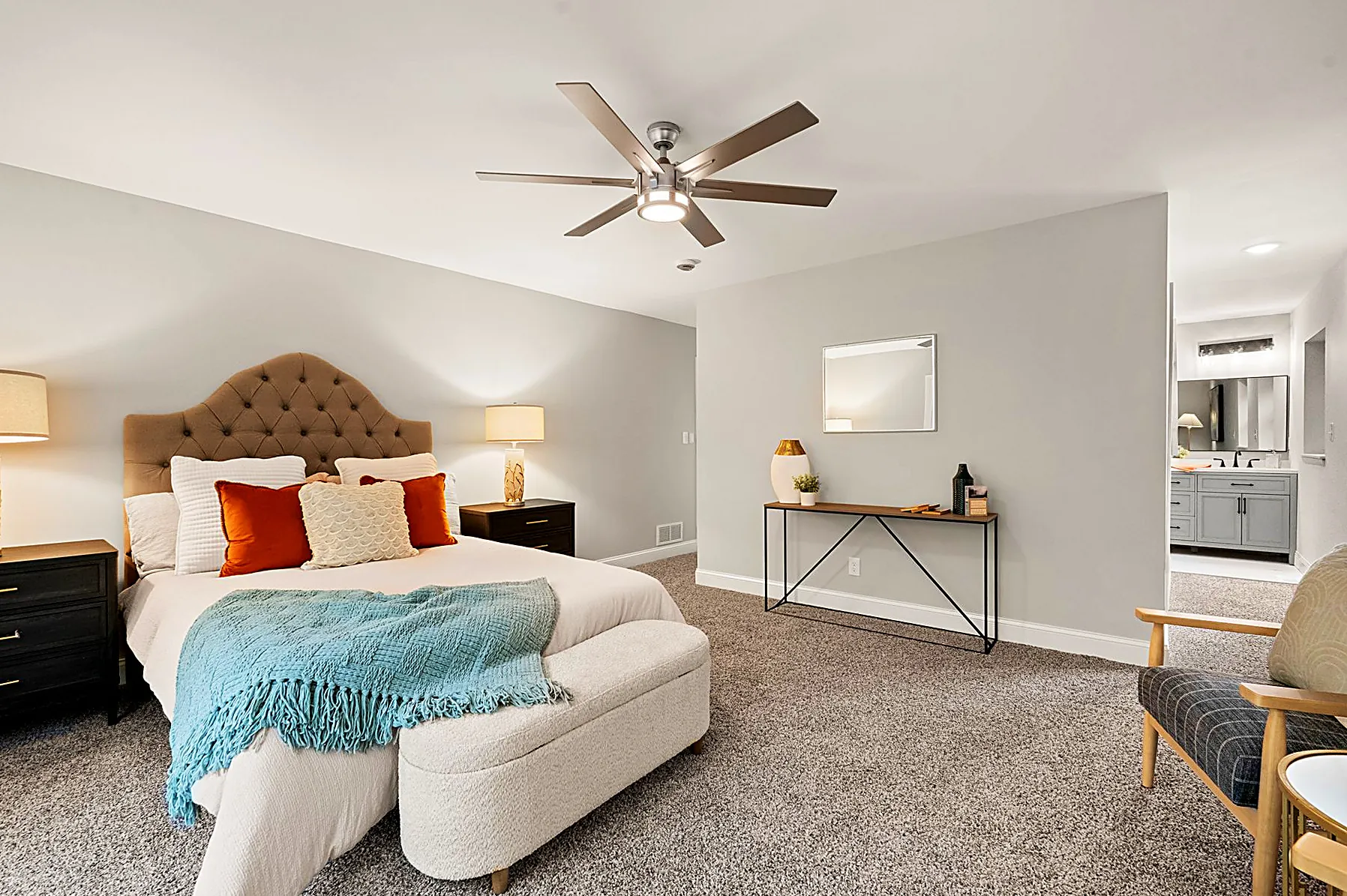 Staged main-level primary suite