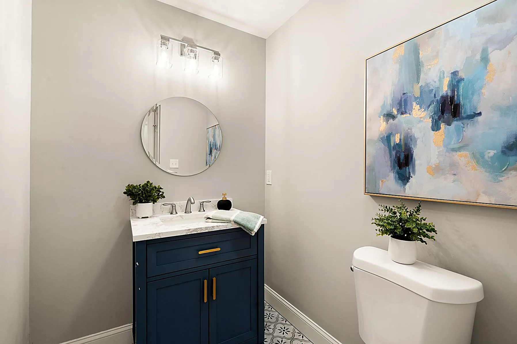 Full bath with a navy vanity
