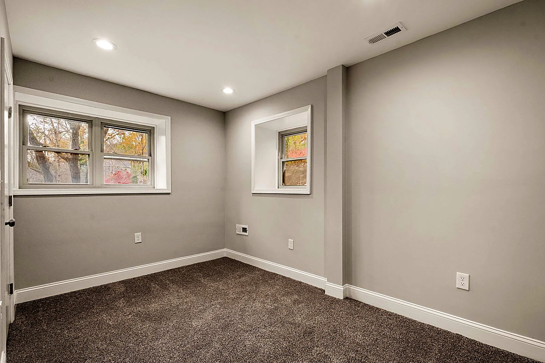 One of two additional bedrooms in the finished walkout lower level