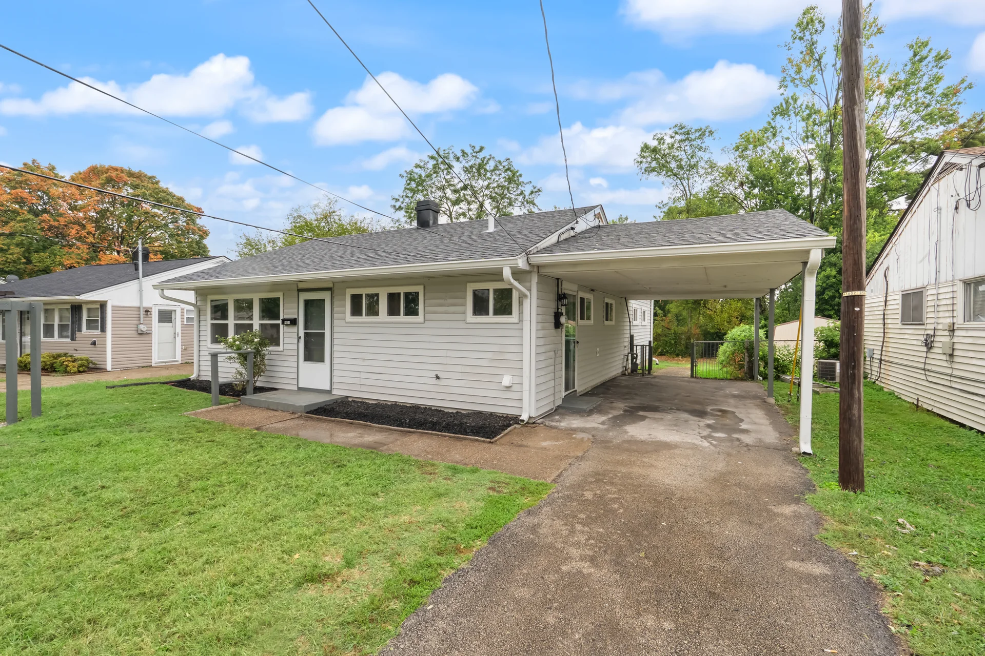Front exterior and carport at 4800 Partridge Run