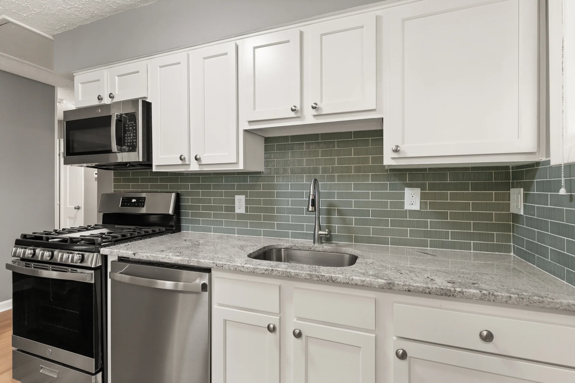 Kitchen tile backsplash at 4800 Partridge Run