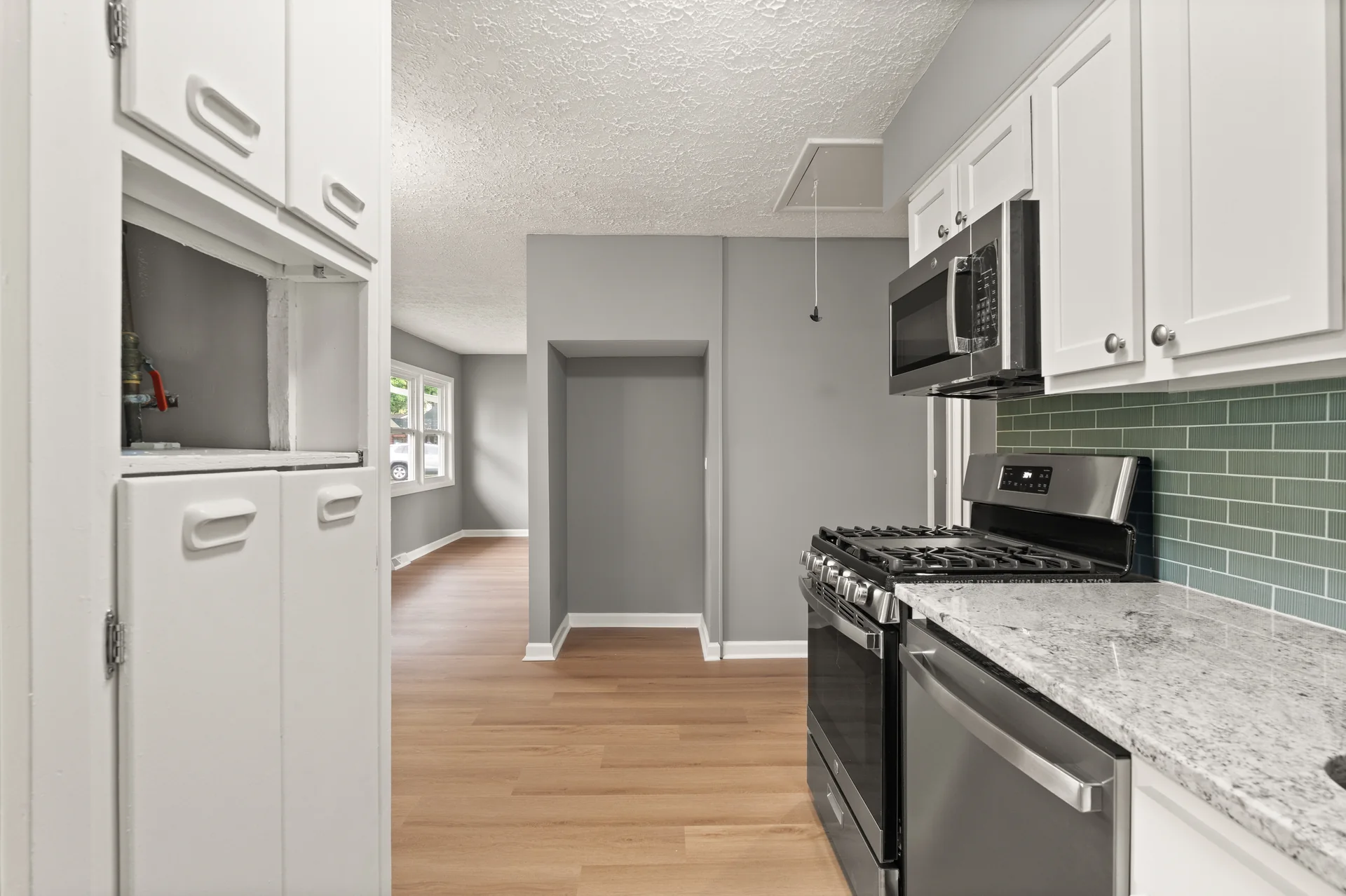 Kitchen toward dining area at 4800 Partridge Run