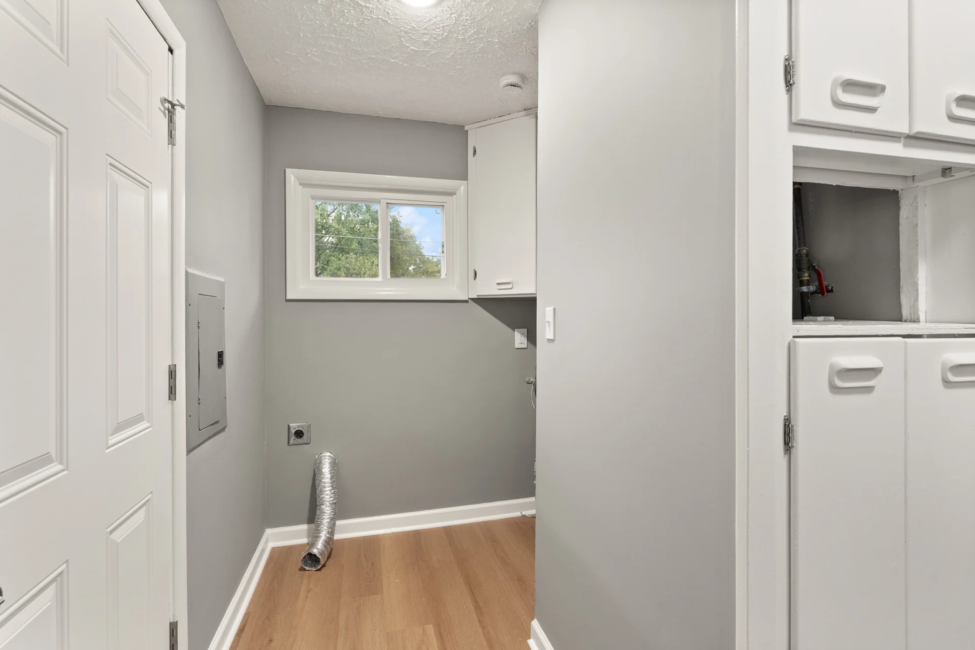 Laundry space off the kitchen at 4800 Partridge Run