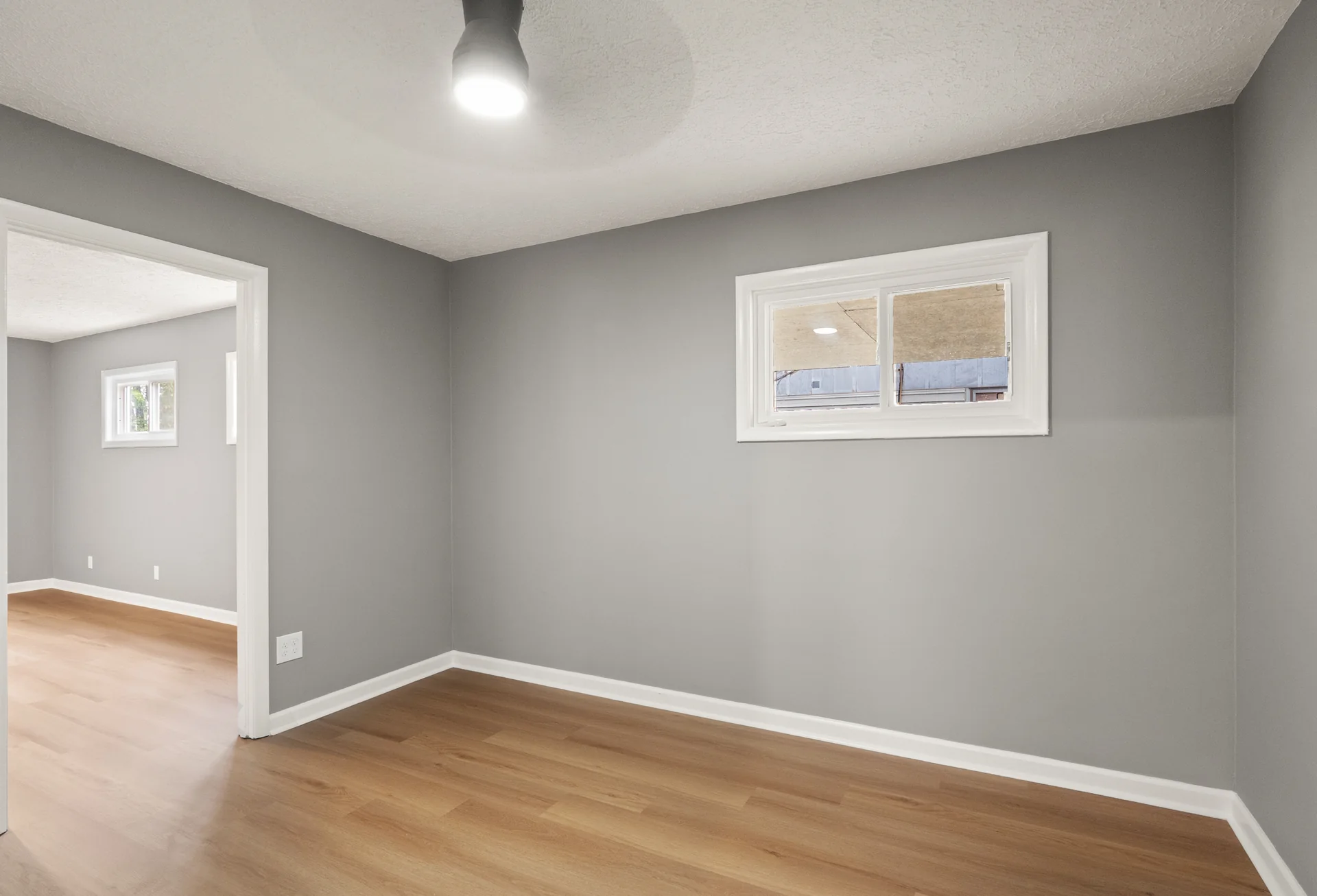 Bedroom with high windows at 4800 Partridge Run