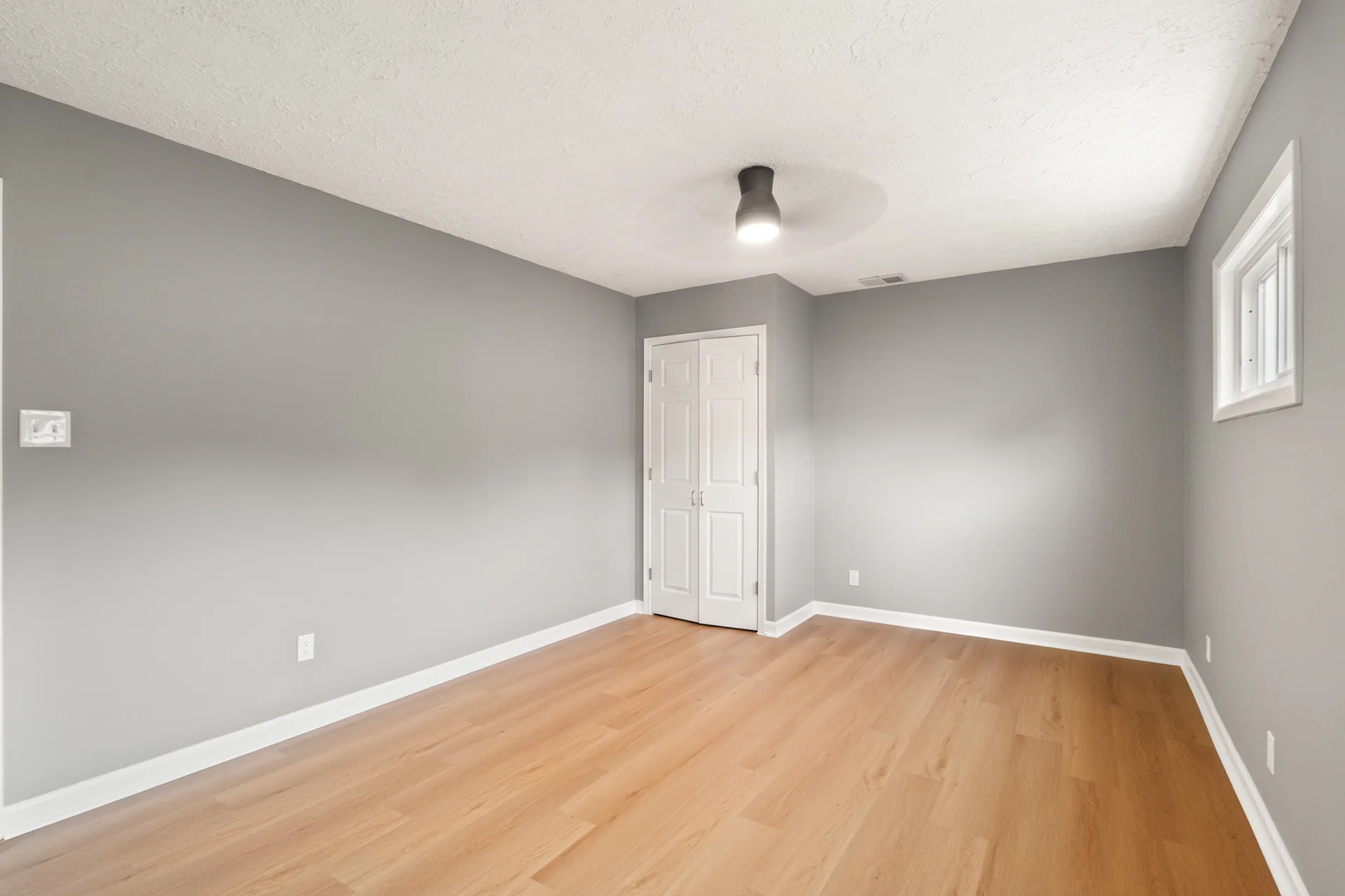 Bedroom with window at 4800 Partridge Run