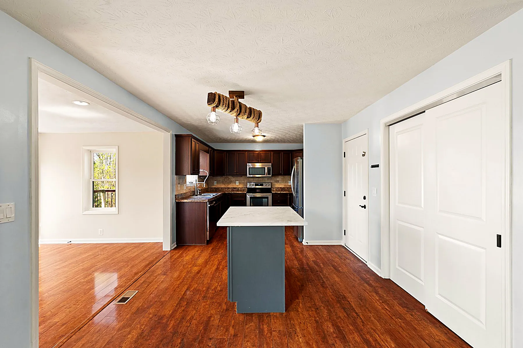 Open dining area connected to the kitchen and living space
