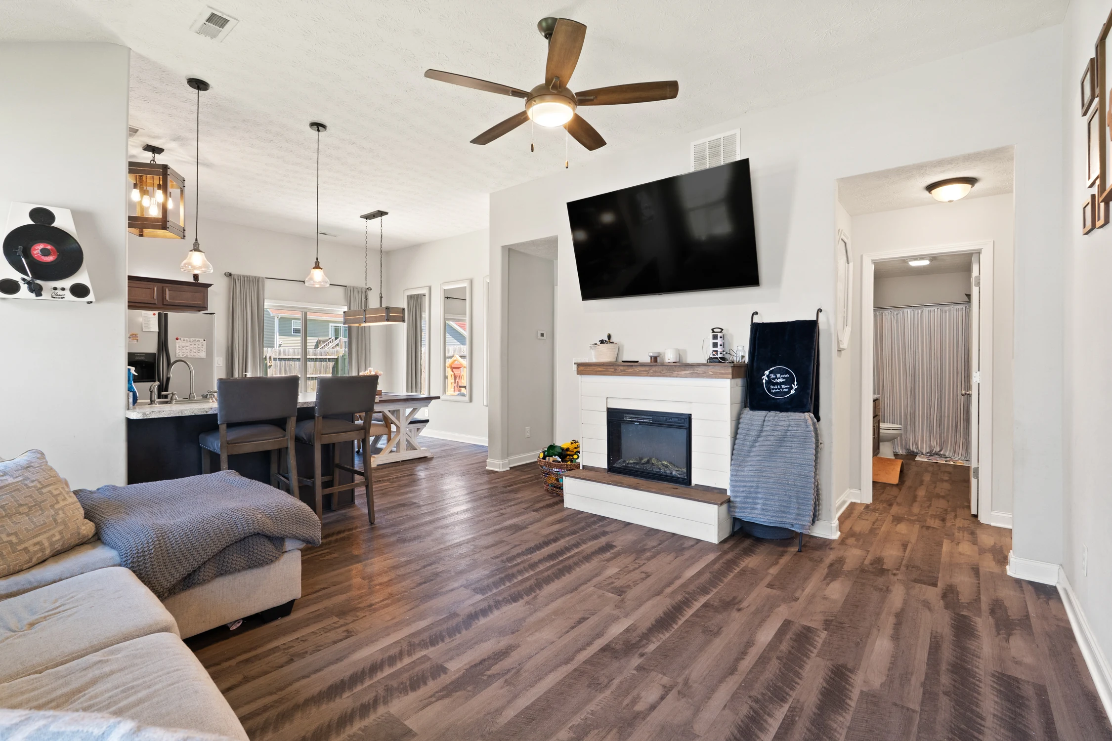 Open vaulted great room flowing into the kitchen and dining area