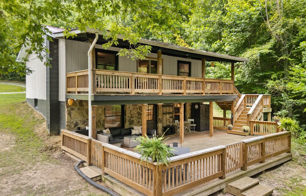 3459 Calder Ln, Scottsburg, IN — walk-out home on 9.14 wooded lakefront acres with a boat dock, for sale