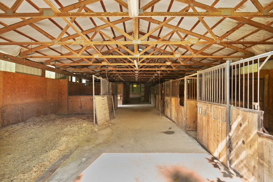 Inside the eight-stall barn at 15116 Wilson Switch Road, Borden, IN 47106.