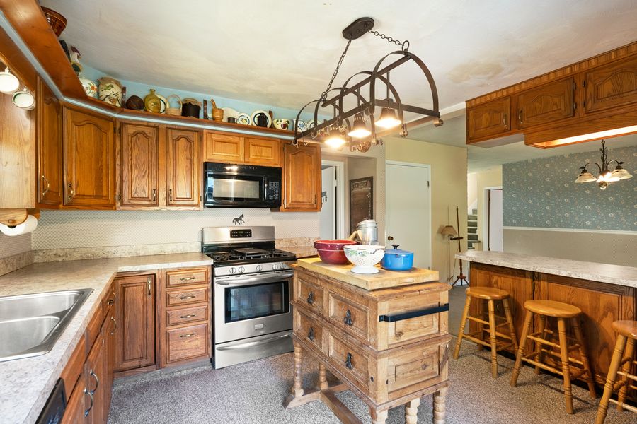 Kitchen island and cabinetry at 15116 Wilson Switch Road, Borden, IN 47106.