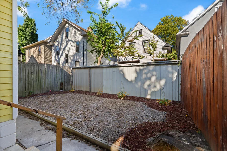 A look at the fenced outdoor space behind the home. 1839 Sherwood Avenue, Louisville, Kentucky.