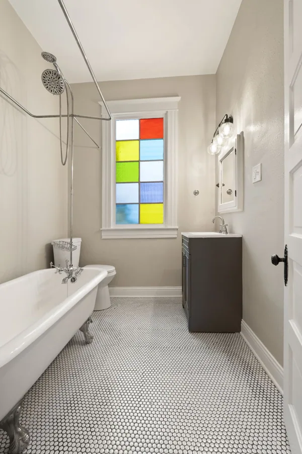 A full view of the upstairs bathroom and its clawfoot tub. 1839 Sherwood Avenue, Louisville, Kentucky.